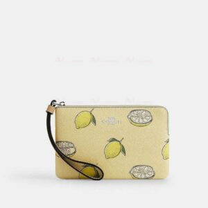 Muñequera verde limones Coach
