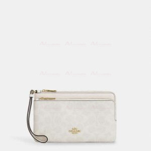Bolsa muñequera blanca Coach