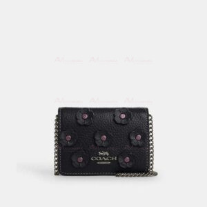 Bandolera negra flores Coach
