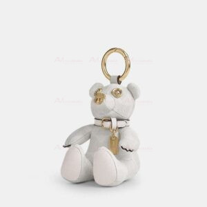 Accesorio para bolsas oso blanco Coach