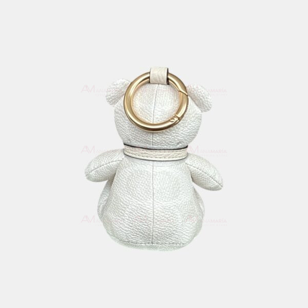 Accesorio para bolsas oso blanco Coach - Imagen 3