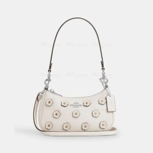 Bolsa bandolera blanca flores Coach