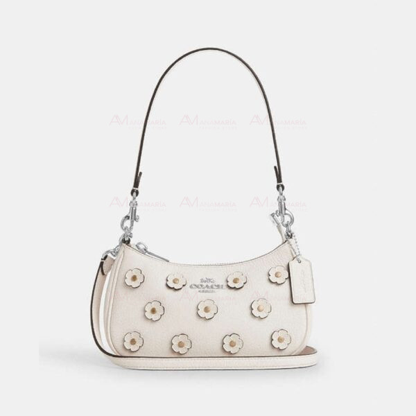 Bolsa bandolera blanca flores Coach