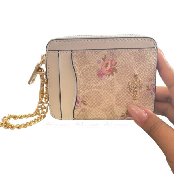 Cartera beige rosas Coach - Imagen 2