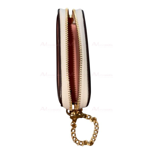 Cartera beige rosas Coach - Imagen 5